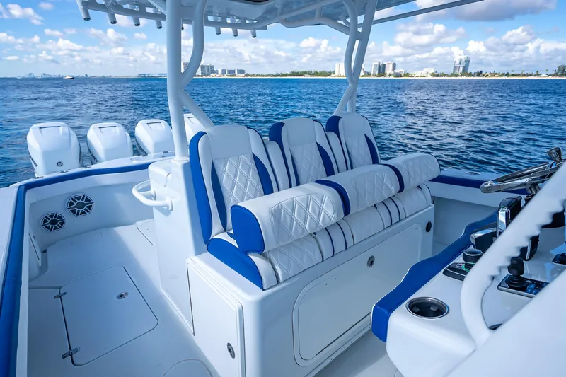 Slide: The Image of 2023 Yellowfin 39 Offshore boat interior with luxurious seating and ocean view. - 35