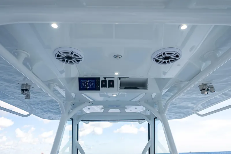 Slide: The Image of 2023 Yellowfin 39 Offshore boat interior with speakers and control panel. - 38