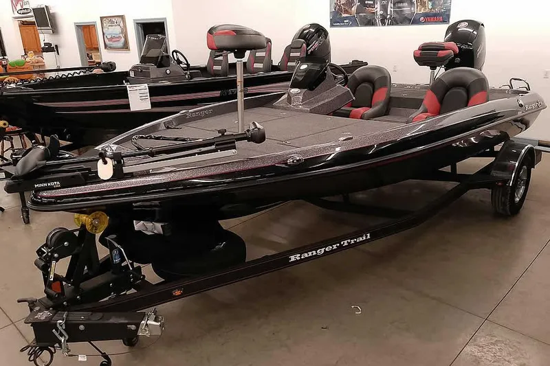 The Image of 2025 Ranger Z185 boat in showroom, featuring sleek design and modern seating. - 0
