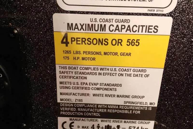 Slide: The Image of 2025 Ranger Z185 boat capacity label: 4 persons, 1265 lbs, 175 HP motor compliance. - 18