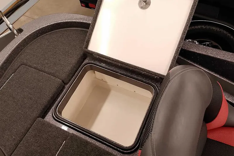 Slide: The Image of Open storage compartment in 2025 Ranger Z185 boat, showcasing interior space. - 23
