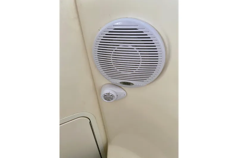 Slide: The Image of White Clarion speaker system on 1997 Sea Ray 330 Sundancer boat interior. - 25