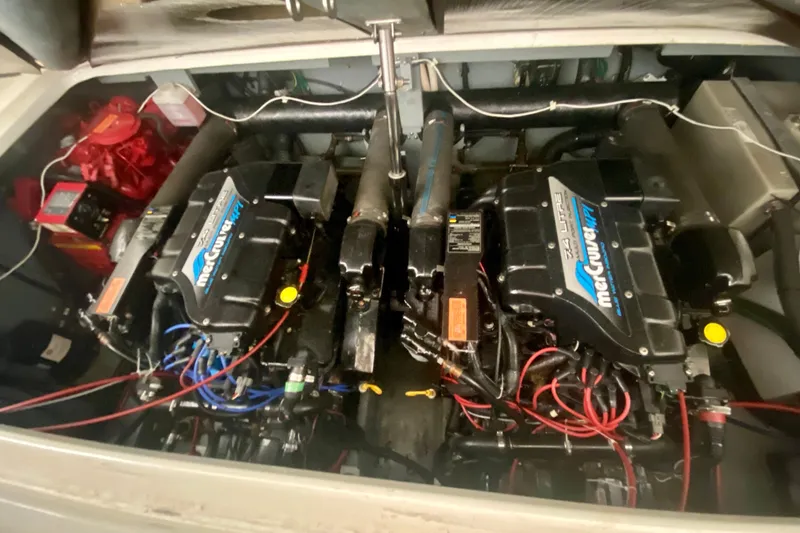Slide: The Image of Engine compartment of a 1997 Sea Ray 330 Sundancer with twin MerCruiser engines. - 29