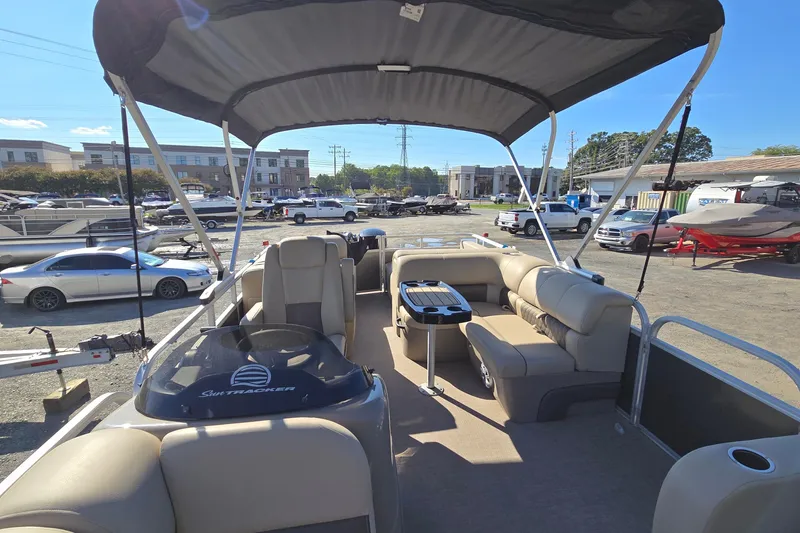 Slide: The Image of 2023 Sun Tracker Party Barge 22 RF DLX pontoon boat with spacious seating and canopy. - 19
