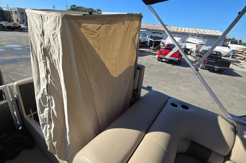 Slide: The Image of 2023 Sun Tracker Party Barge 22 RF DLX with privacy enclosure and seating area. - 35