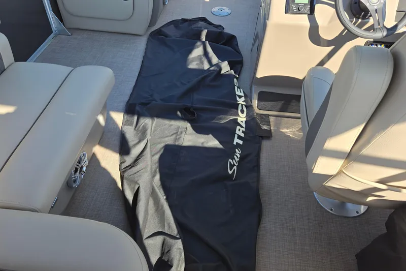 Slide: The Image of 2023 Sun Tracker Party Barge 22 RF DLX interior with cover and seating. - 42