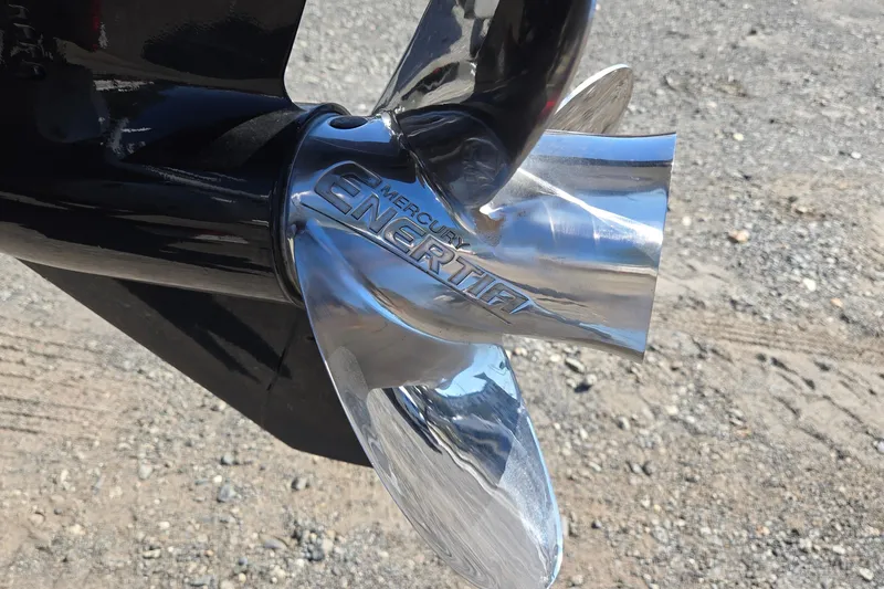 Slide: The Image of Close-up of a Mercury Enertia propeller on a 2023 Sun Tracker Party Barge 22 RF DLX. - 55