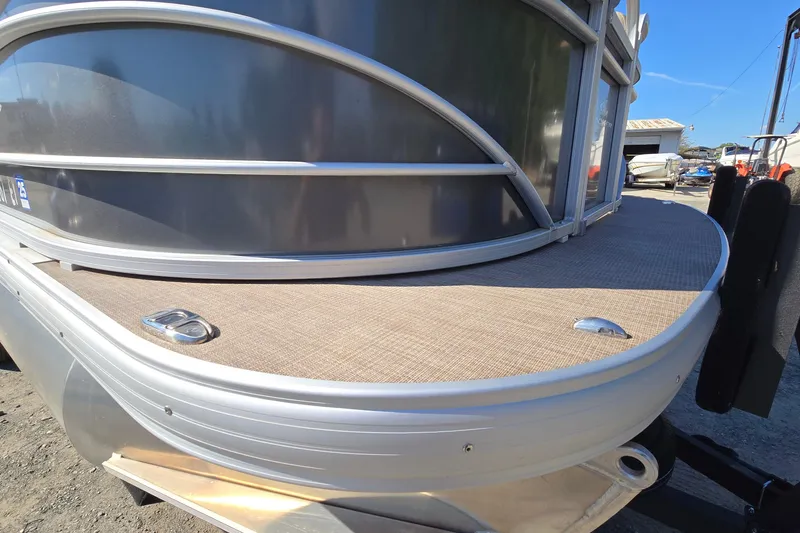 Slide: The Image of 2023 Sun Tracker Party Barge 22 RF DLX pontoon boat, close-up of deck and railing. - 6