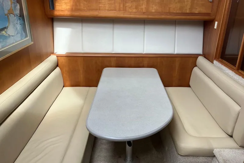 Slide: The Image of Interior of 1994 Silverton 41 Aft Cabin yacht with kitchen and skylight view. - 13