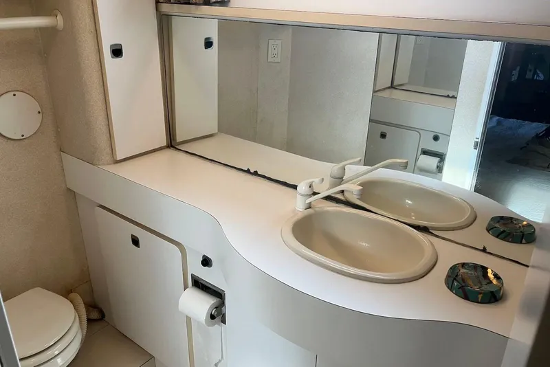 Slide: The Image of Electrical control panel of a 1994 Silverton 41 Aft Cabin boat. - 15