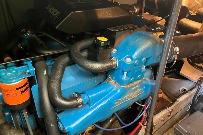 Slide: The Image of Engine of a 1994 Silverton 41 Aft Cabin boat, featuring Crusader components. - 21