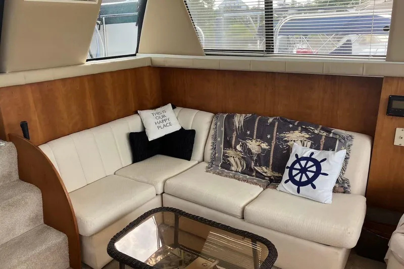 Slide: The Image of 1994 Silverton 41 Aft Cabin kitchen with modern appliances and stylish backsplash. - 9