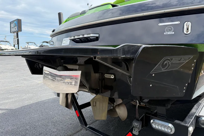 Slide: The Image of 2019 Axis A24 boat rear view with Surf Gate and Power Wedge features. - 6