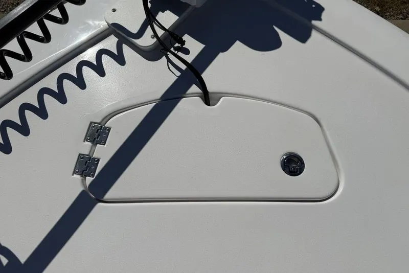 Slide: The Image of 2026 Tidewater 2500 Carolina Bay boat deck with hatch and hinges. - 3