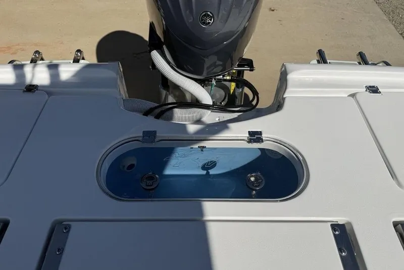 Slide: The Image of 2026 Tidewater 2500 Carolina Bay boat with engine and livewell. - 35