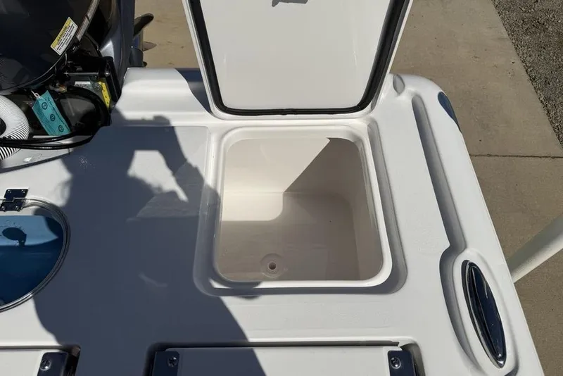 Slide: The Image of Open storage compartment on 2026 Tidewater 2500 Carolina Bay boat deck. - 40