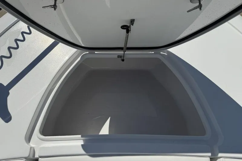 Slide: The Image of Open storage compartment on 2026 Tidewater 2500 Carolina Bay boat. - 7