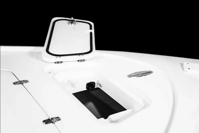 Slide: The Image of 2026 Contender 26 Bay boat deck with open hatch, showcasing sleek design. - 11