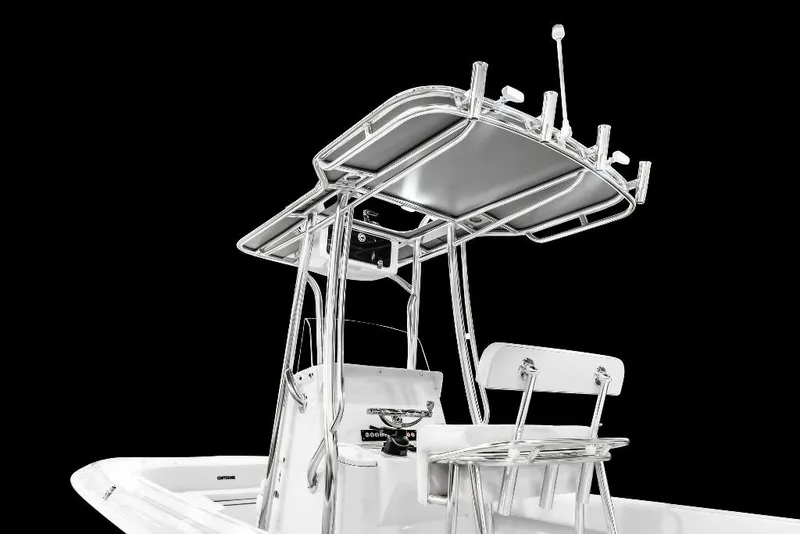 Slide: The Image of 2026 Contender 26 Bay boat with sleek T-top and seating, against a black background. - 13