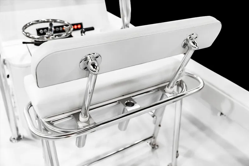 Slide: The Image of 2026 Contender 26 Bay boat interior with sleek white seating and chrome details. - 14