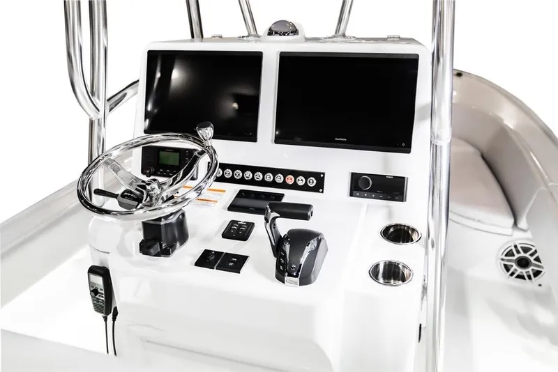 Slide: The Image of 2026 Contender 26 Bay boat console with dual screens and modern controls. - 18