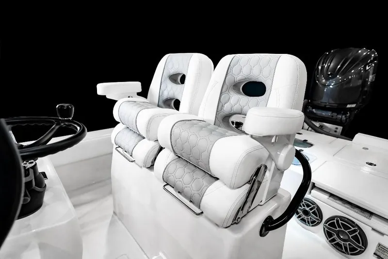 Slide: The Image of Luxury seating on 2026 Contender 26 Bay boat with modern design and premium materials. - 7