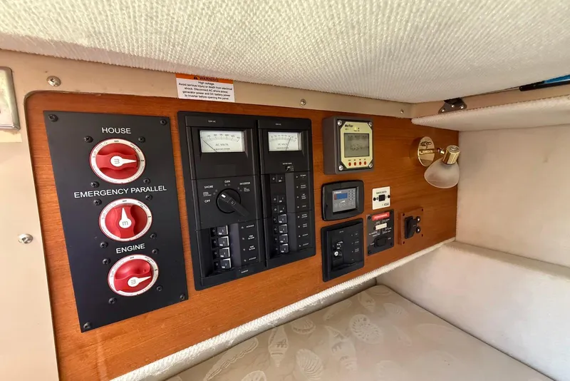Slide: The Image of Electrical control panel inside 2017 Ranger Tugs R-23 boat cabin. - 18
