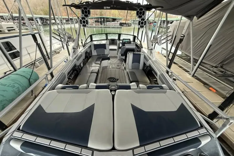 Slide: The Image of 2021 Malibu Wakesetter 25 LSV boat interior with spacious seating and modern design. - 21