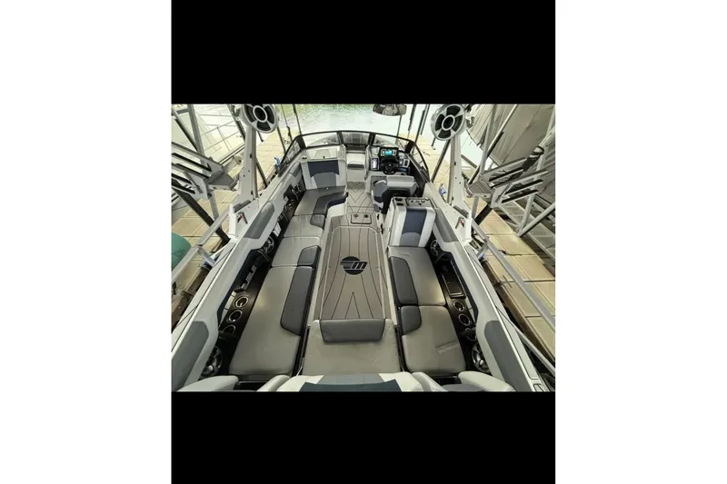 Slide: The Image of 2021 Malibu Wakesetter 25 LSV interior with spacious seating and modern design. - 22