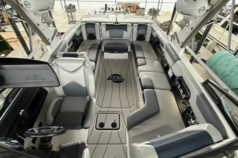 Slide: The Image of 2021 Malibu Wakesetter 25 LSV interior with spacious seating and modern design. - 23