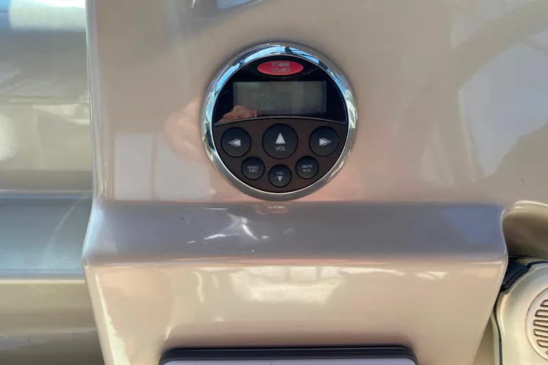 Slide: The Image of Control panel on a 2006 Sea Ray 240 Sundancer boat dashboard. - 10