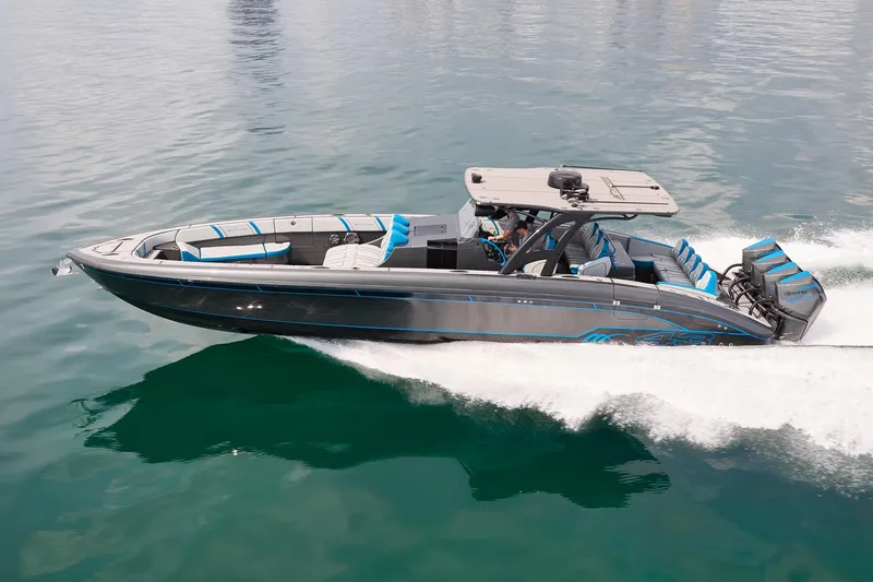 The Image of 2020 Midnight Express 43' Open boat cruising on clear water. - 0