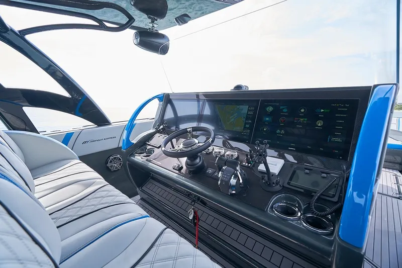 Slide: The Image of Cockpit of 2020 Midnight Express 43' Open boat with advanced navigation system. - 12