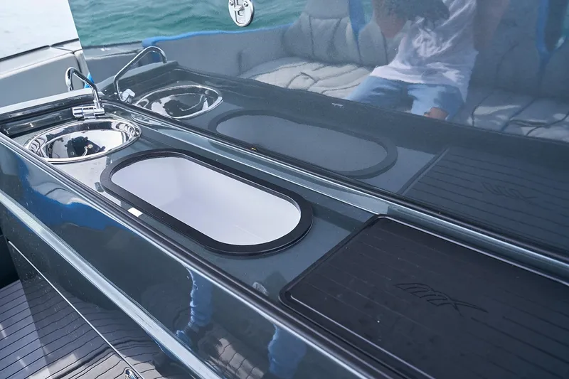 Slide: The Image of Luxury kitchen area on 2020 Midnight Express 43' Open boat with sink and counter. - 14