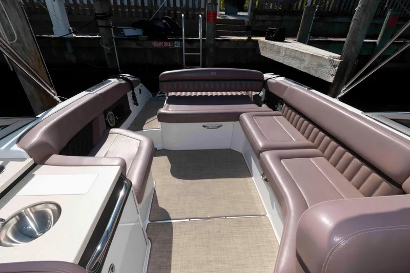 Slide: The Image of 2013 Cobalt A28 boat interior with luxurious seating and modern design. - 12