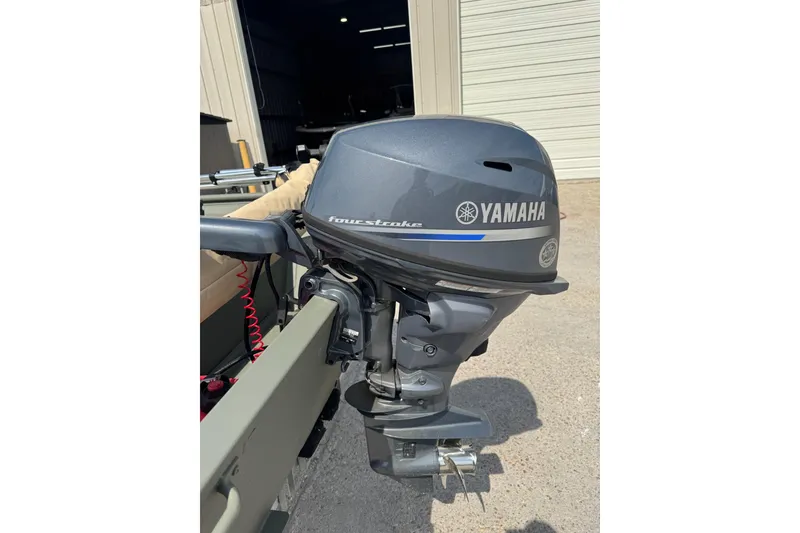 Slide: The Image of 2021 Weldcraft 15 boat with Yamaha four-stroke outboard motor. - 16
