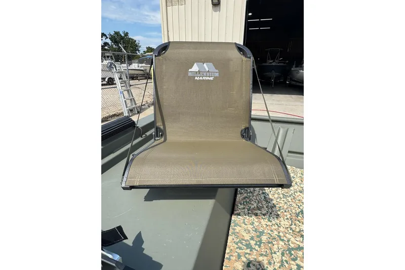 Slide: The Image of 2021 Weldcraft 15 boat with Millennium Marine seat, outdoor setting. - 21