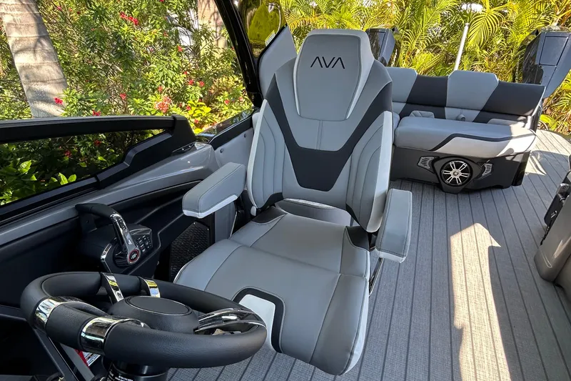 Slide: The Image of 2026 Avalon Excalibur boat interior with modern seating and steering wheel. - 12