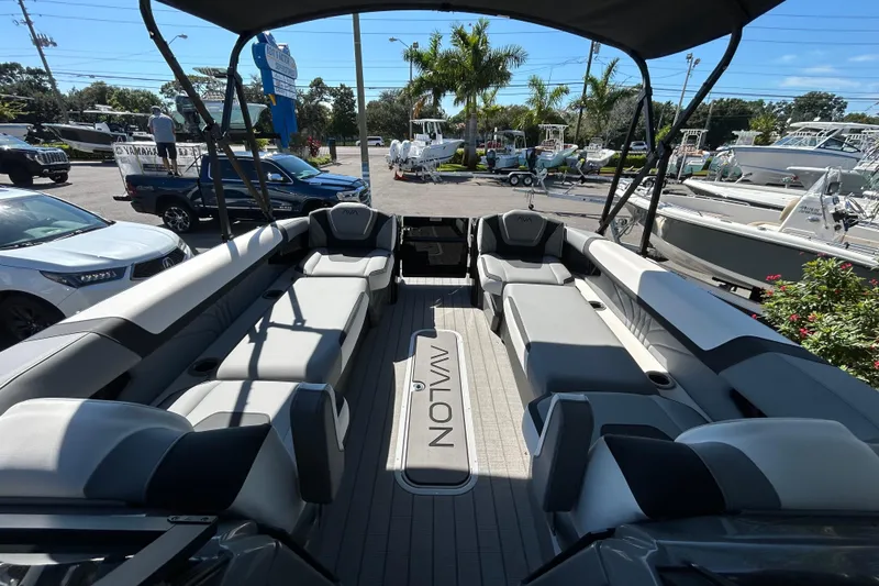 Slide: The Image of 2026 Avalon Excalibur 27-foot boat interior with luxurious seating and modern design. - 14