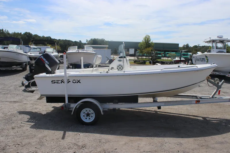 Slide: The Image of 2007 Sea Fox 172 Center Console boat on trailer, parked outdoors. - 4