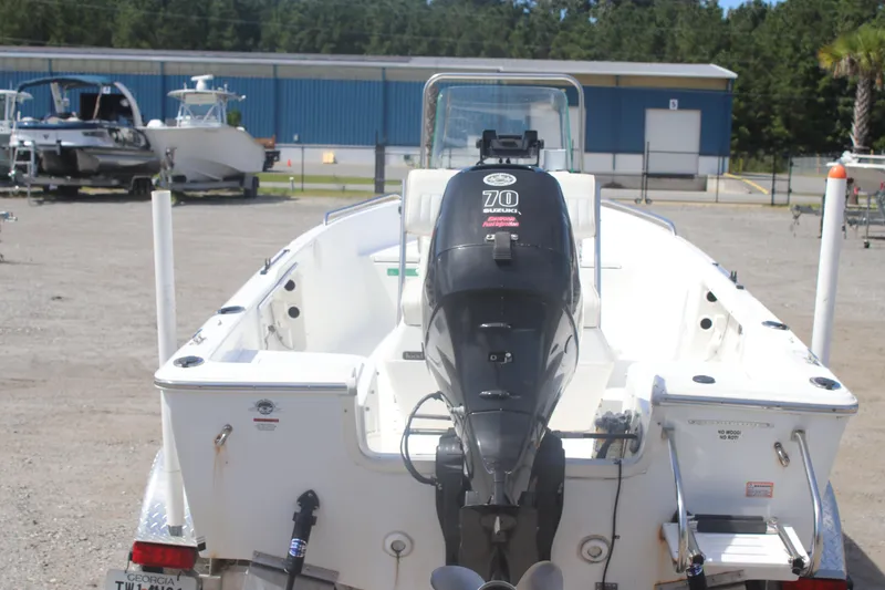 Slide: The Image of 2007 Sea Fox 172 Center Console boat with Suzuki 70 outboard motor, parked outdoors. - 6