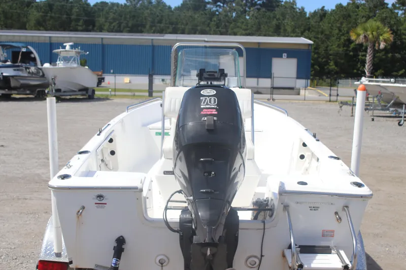 Slide: The Image of 2007 Sea Fox 172 Center Console boat with Suzuki 70 outboard motor in a marina setting. - 7