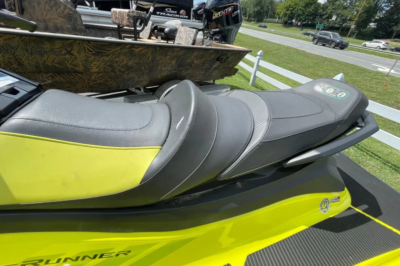 Slide: The Image of 2021 Yamaha WaveRunner VX Cruiser HO with sleek black and yellow seat design. - 4