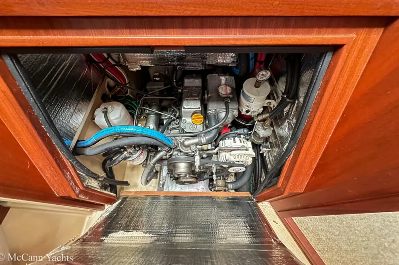 Slide: The Image of Engine compartment of 2010 Island Packet Estero yacht, showcasing mechanical components. - 36