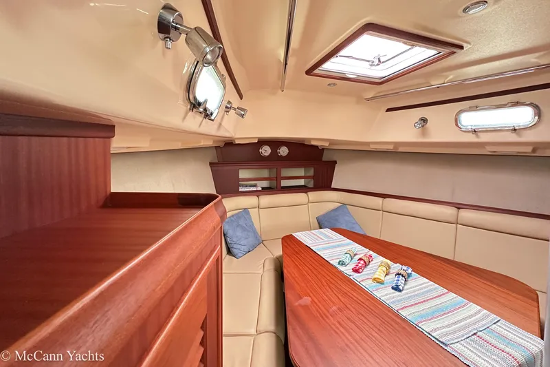 Slide: The Image of Luxurious interior of 2010 Island Packet Estero yacht with elegant wood finish and cozy seating. - 37