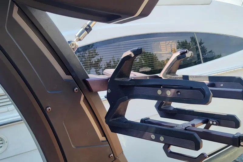 Slide: The Image of 2023 Tigé Z3 boat with a close-up of a wakeboard rack. - 17