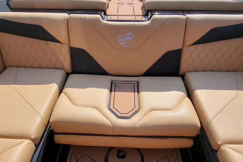Slide: The Image of 2023 Tigé Z3 boat interior with tan and black leather seating. - 6