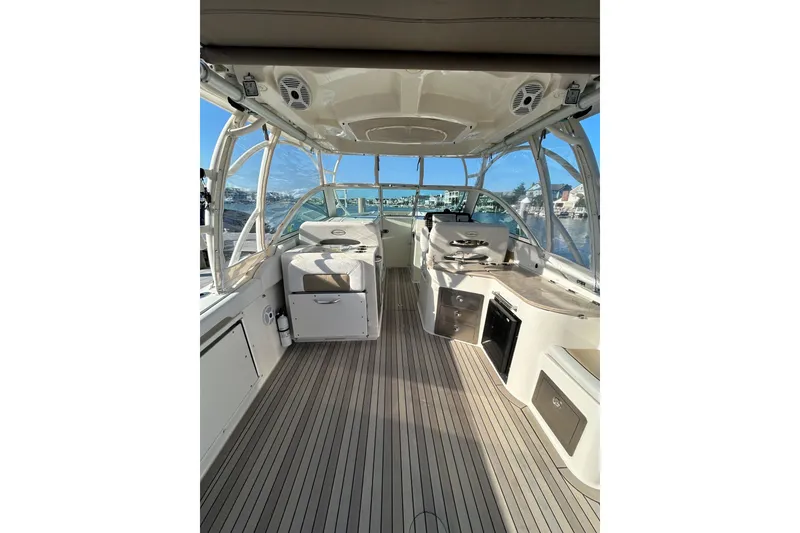Slide: The Image of 2016 Sailfish 325 DC boat interior with spacious deck and modern amenities. - 21