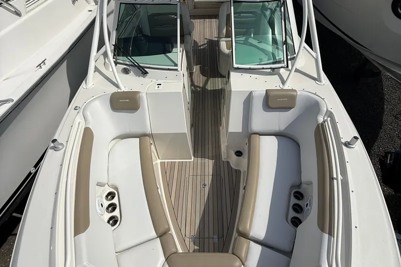 Slide: The Image of 2016 Sailfish 325 DC boat interior with spacious seating and modern design. - 4