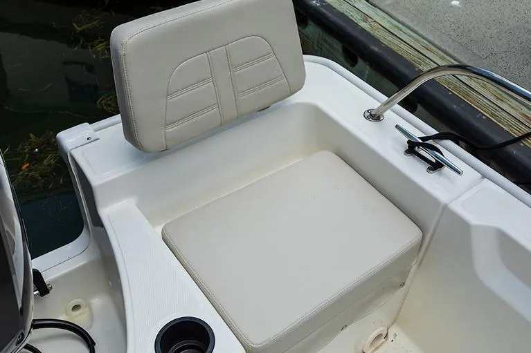 Slide: The Image of Simrad display and compass on 2026 Boston Whaler 190 Montauk boat dashboard. - 9